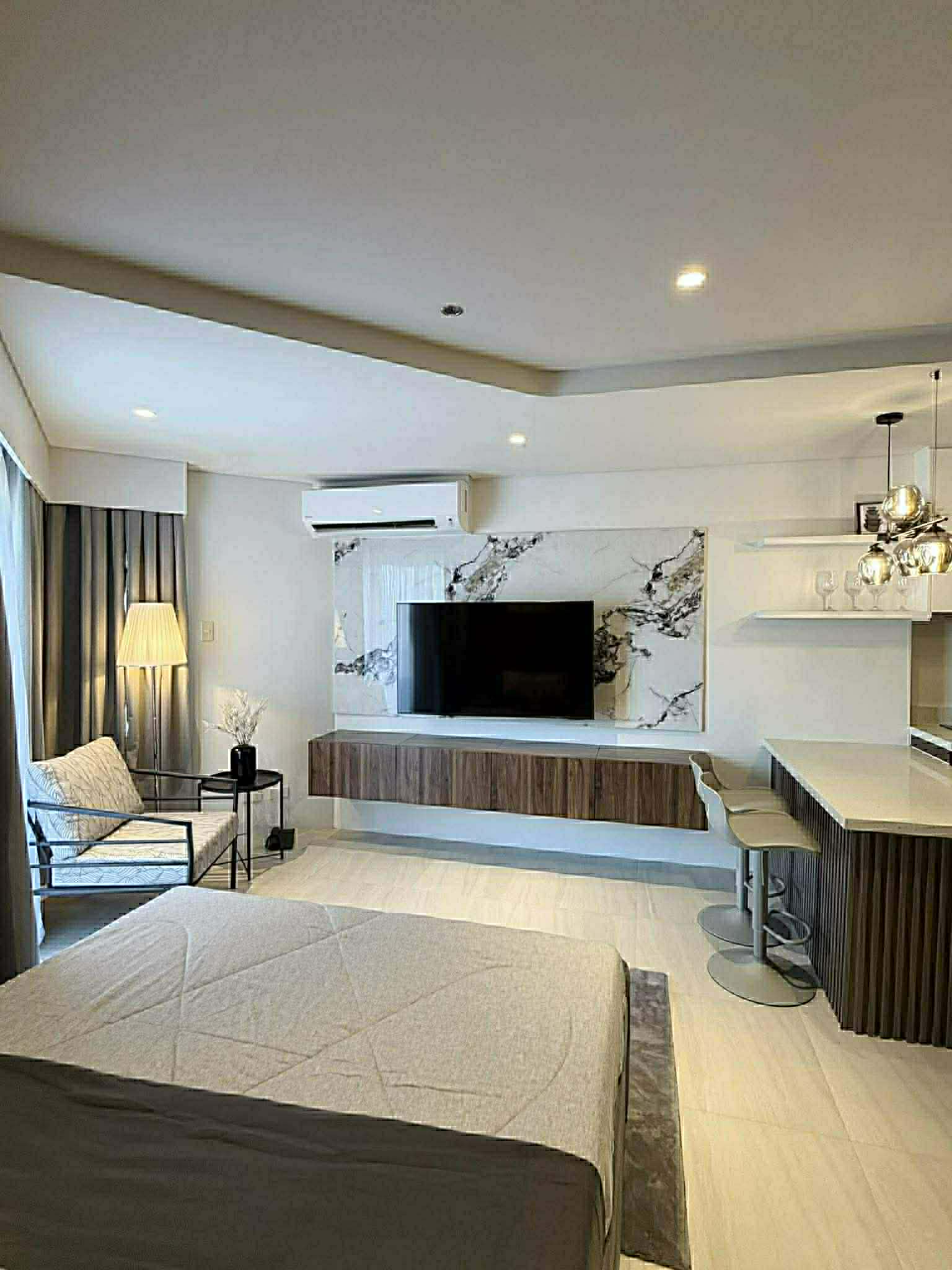 Luxury Fully Furnished Studio for Rent at Tambuli Seaside Resort & Spa | 16th Floor | 36.5 SQM | WiFi & Parking Included https://rent.ph/uploads/0016/16244/2026/03/03/2.jpg